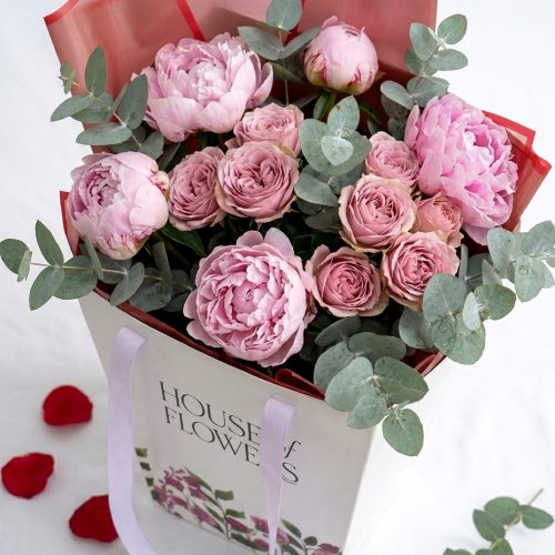 Close up of fresh peonies garden roses and eucalyptus spring flowers Dubai