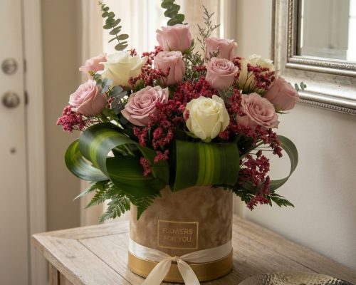 Wrapped spring flower bouquet with handwritten card as gift in Dubai